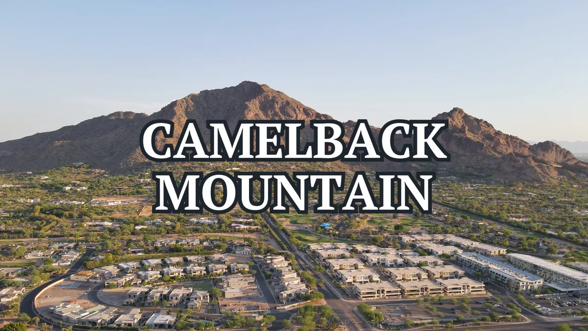 A sweeping view of Camelback Mountain rising above nearby residential areas and green spaces. The landscape is vibrant and serene, offering a taste of the natural beauty and outdoor adventure opportunities just minutes from the property.